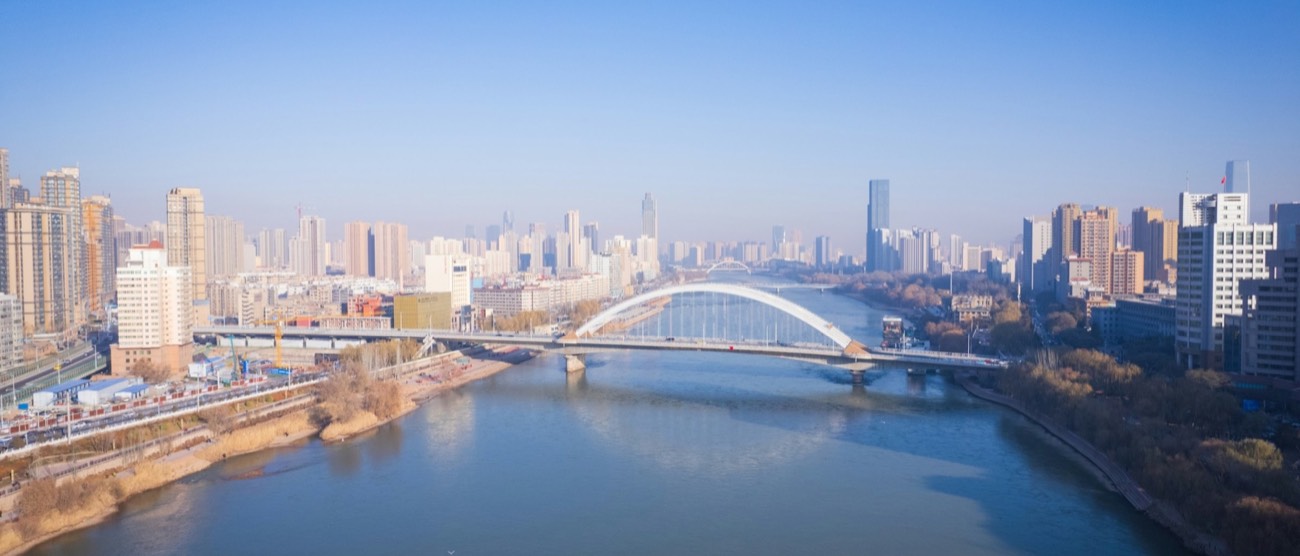 Aerial view of the Yellow River and Zhongshan Bridge running through Lanzhou, the capital of Gansu