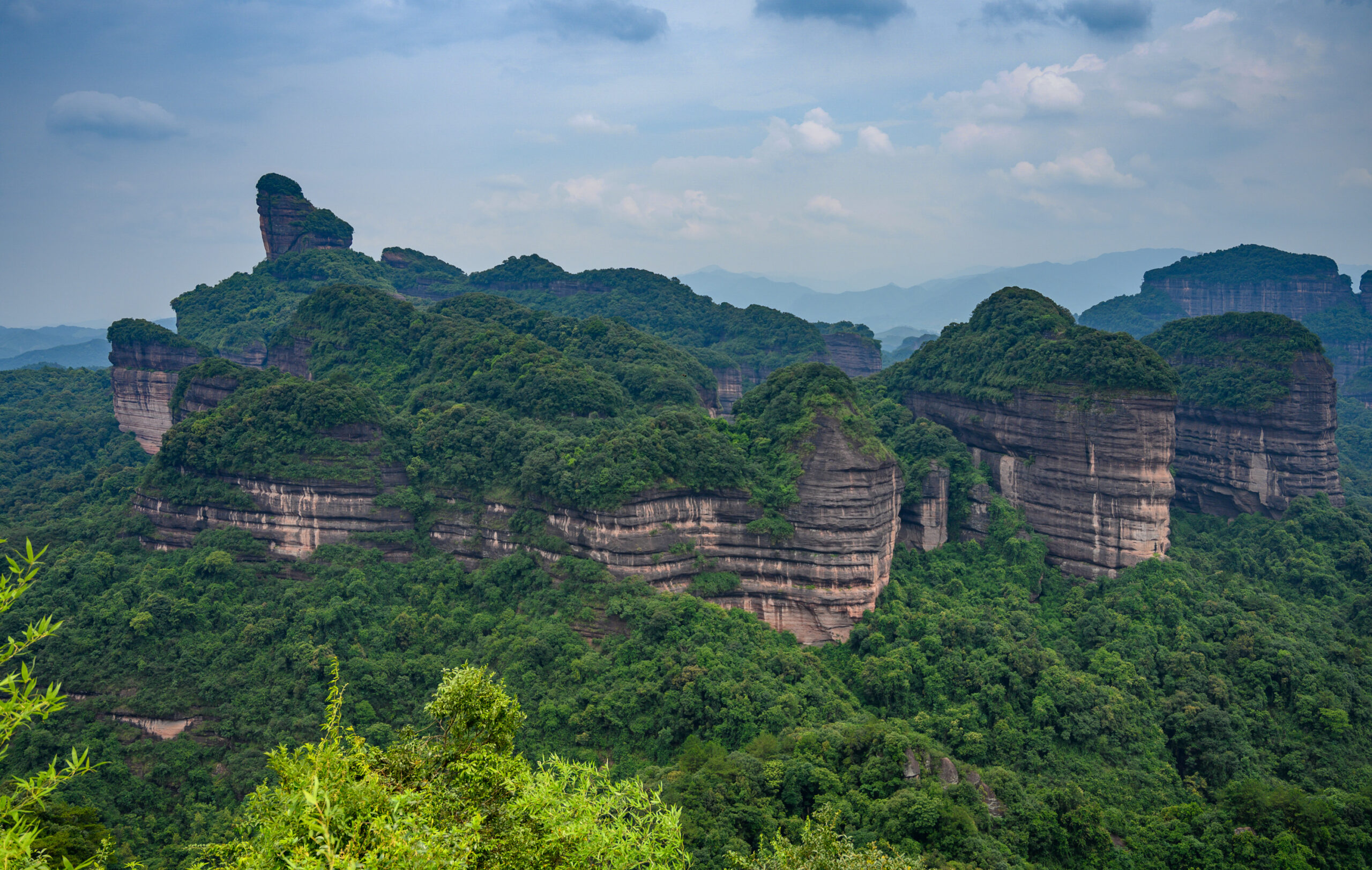 Mount Danxia red sandstone cliffs in Shaoguan, Guangdong, China — UNESCO World Heritage geological park