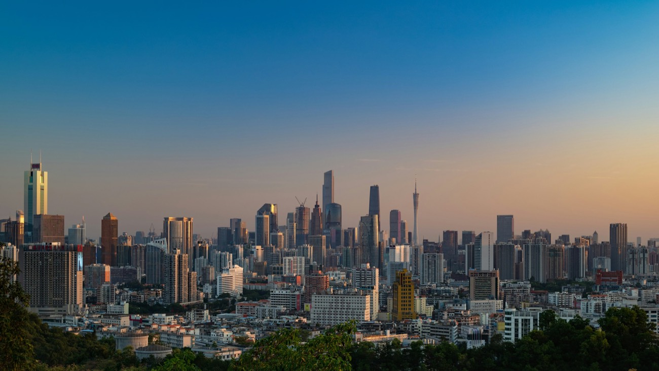 Guangzhou Pearl River skyline at dusk with Canton Tower and Tianhe CBD