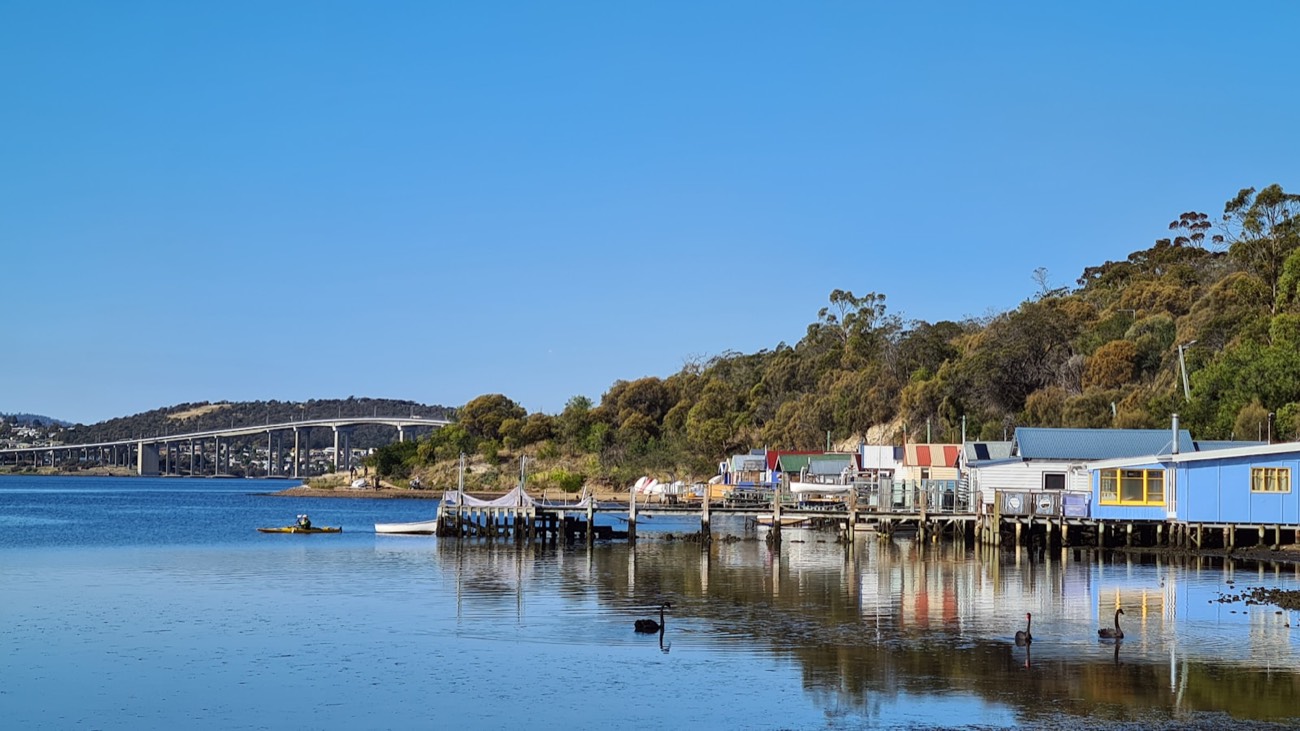 Hobart waterfront with boathouses and Tasman Bridge — learn Mandarin in Hobart with WillyChina