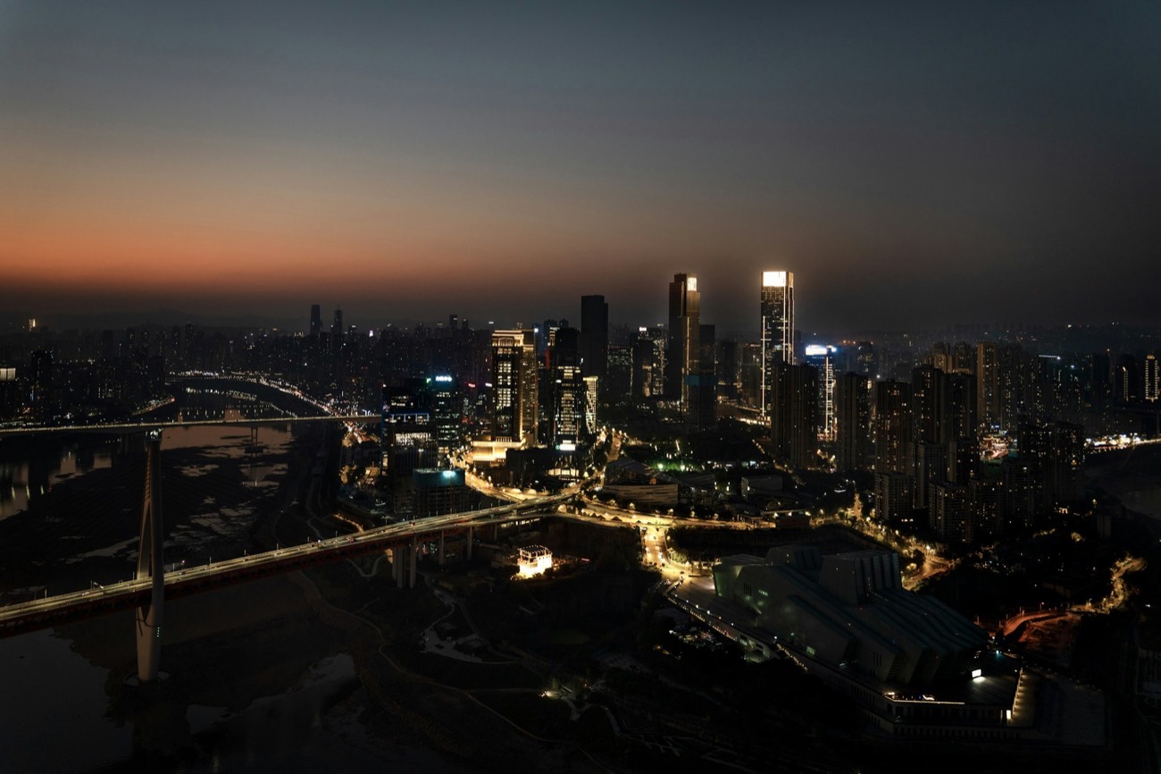 Chongqing&rsquo;s dense, mountainous skyline glowing at night
