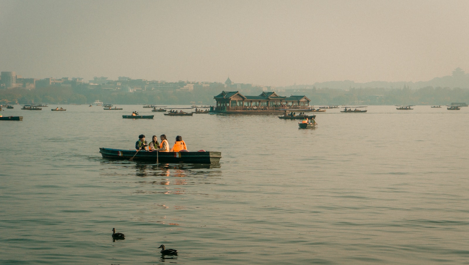 Wooden boats on West Lake at dusk, Hangzhou