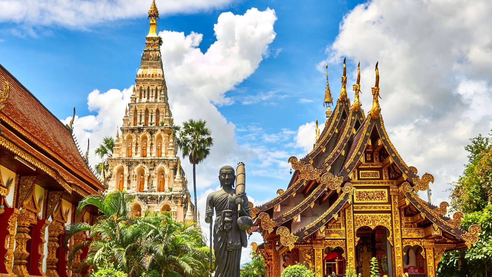 Ornate Buddhist temple statues at Wiang Kum Kam, northern Thailand — Mandarin lessons online with WillyChina