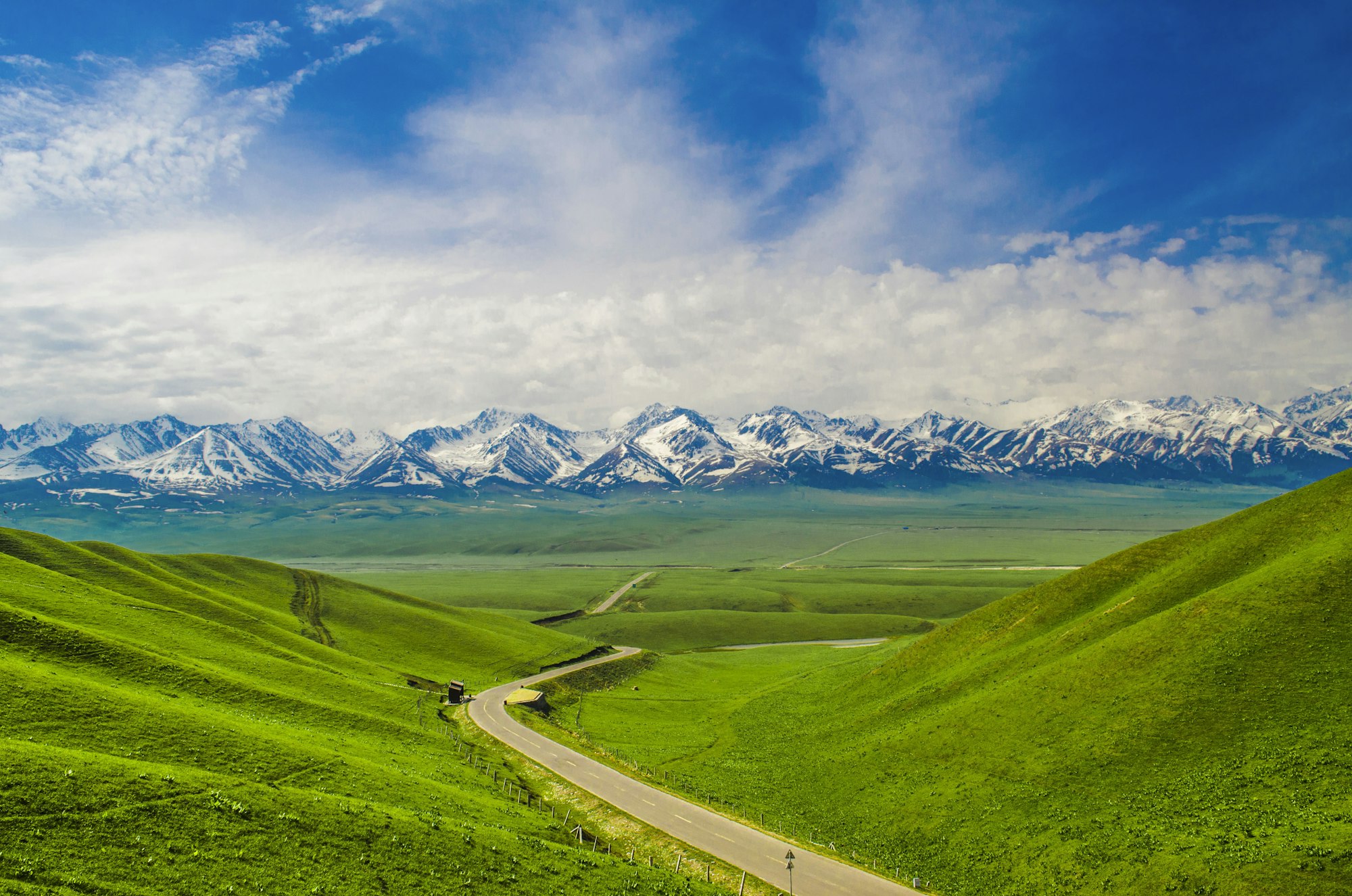 The snow-capped Tianshan mountains above Heavenly Lake, Xinjiang, China