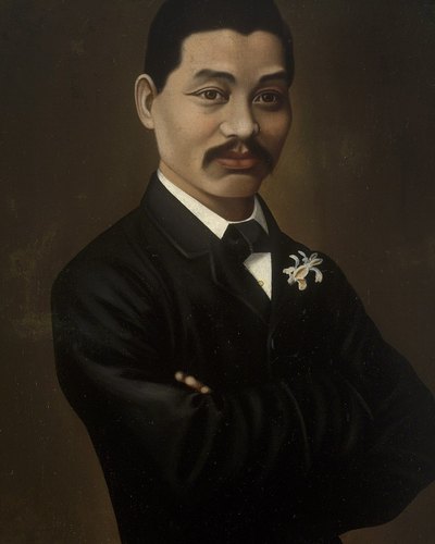 Oil portrait of Mei Quong Tart in a dark suit with arms folded, painted around 1885.
