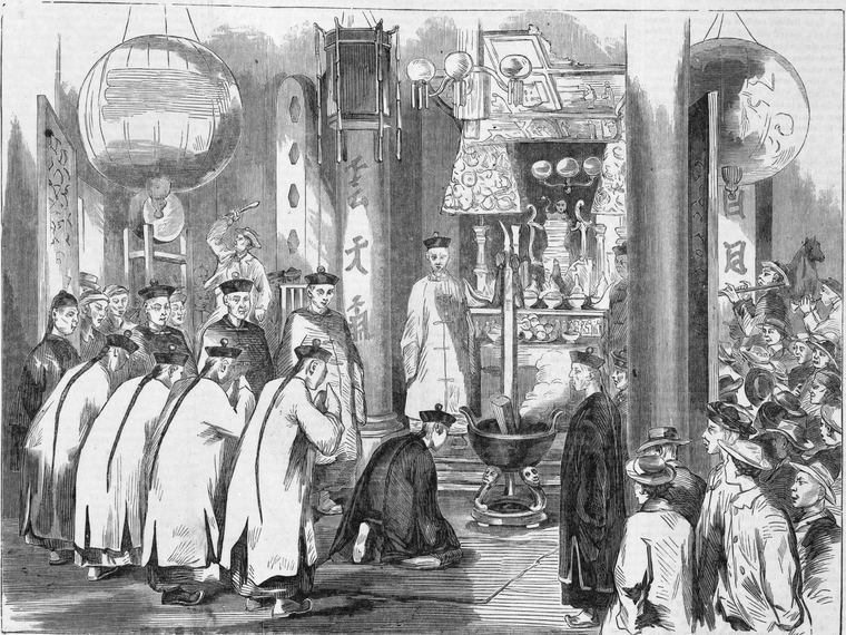 A wood engraving of the opening of a Chinese joss house at Emerald Hill, Melbourne, in 1866: robed worshippers bowing before an altar hung with lanterns and banners.