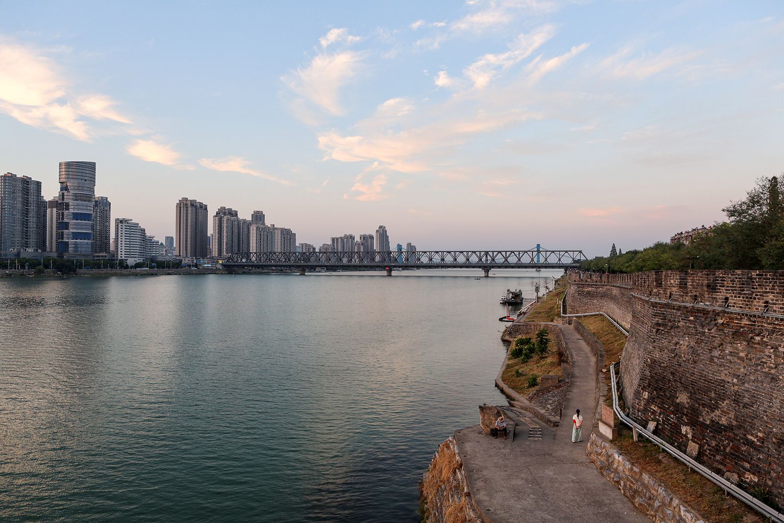 The Han River at Xiangyang at sunset, with the old city wall at the water’s edge