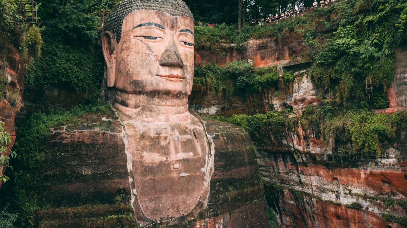 The 71-metre Leshan Giant Buddha carved into a Tang-dynasty cliff face, Sichuan