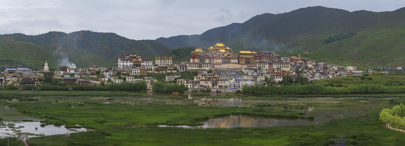 Songzanlin Monastery and its lake reflection, the Little Potala Palace of Yunnan, in Shangri-La