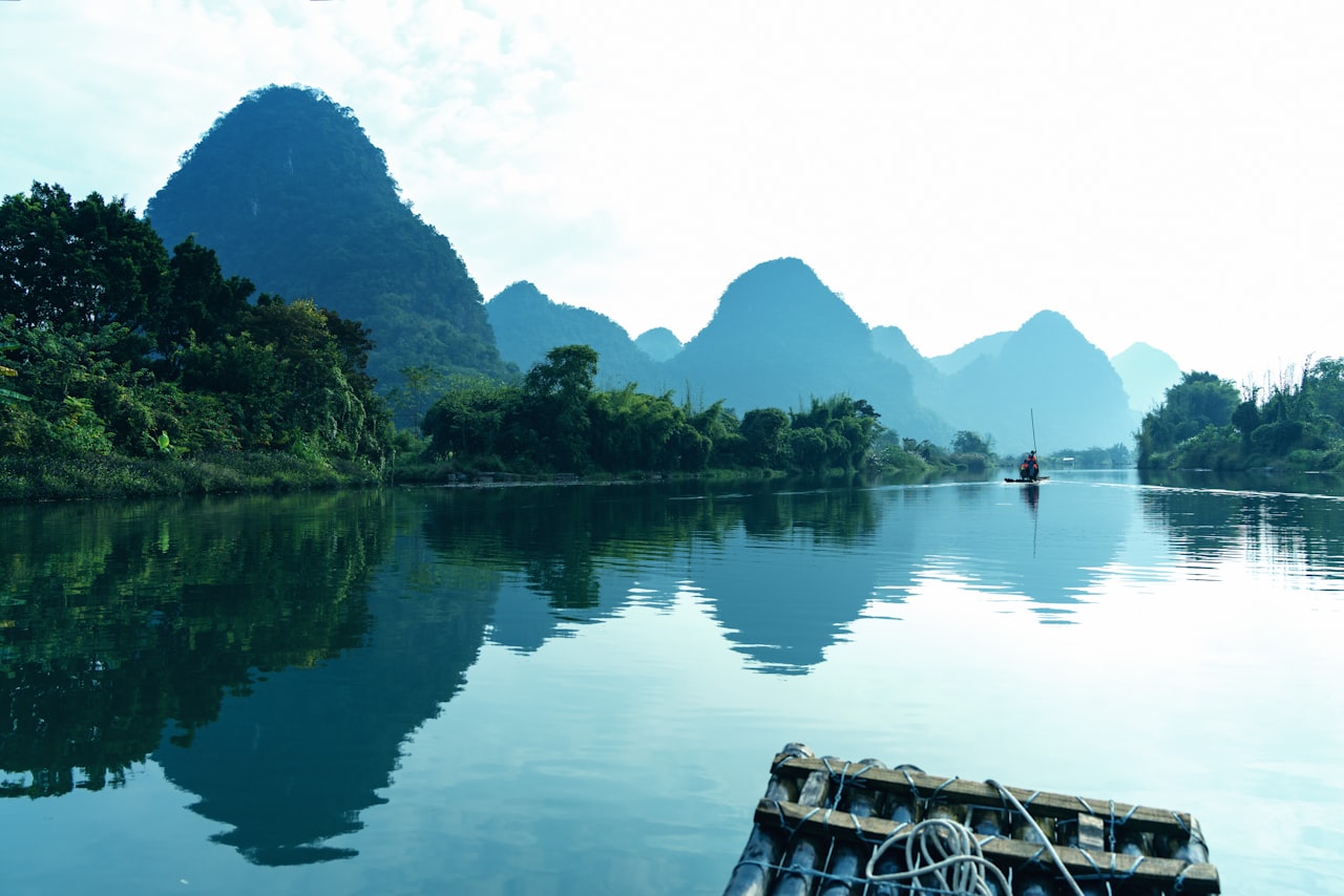 A boat on the river among karst peaks near Guilin, Guangxi