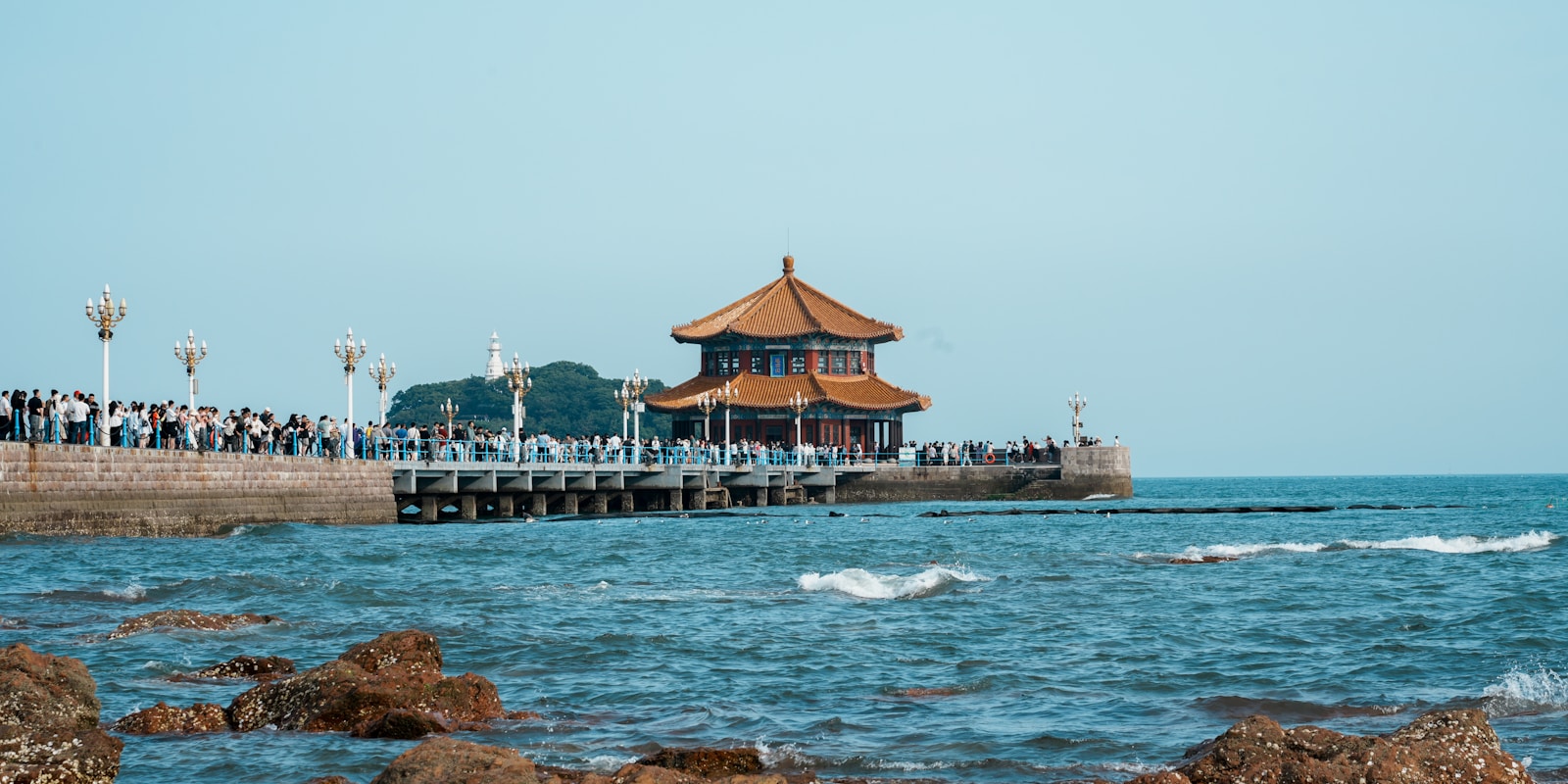 Zhanqiao Pier and the Huilan Pavilion reaching into the bay at Qingdao, Shandong