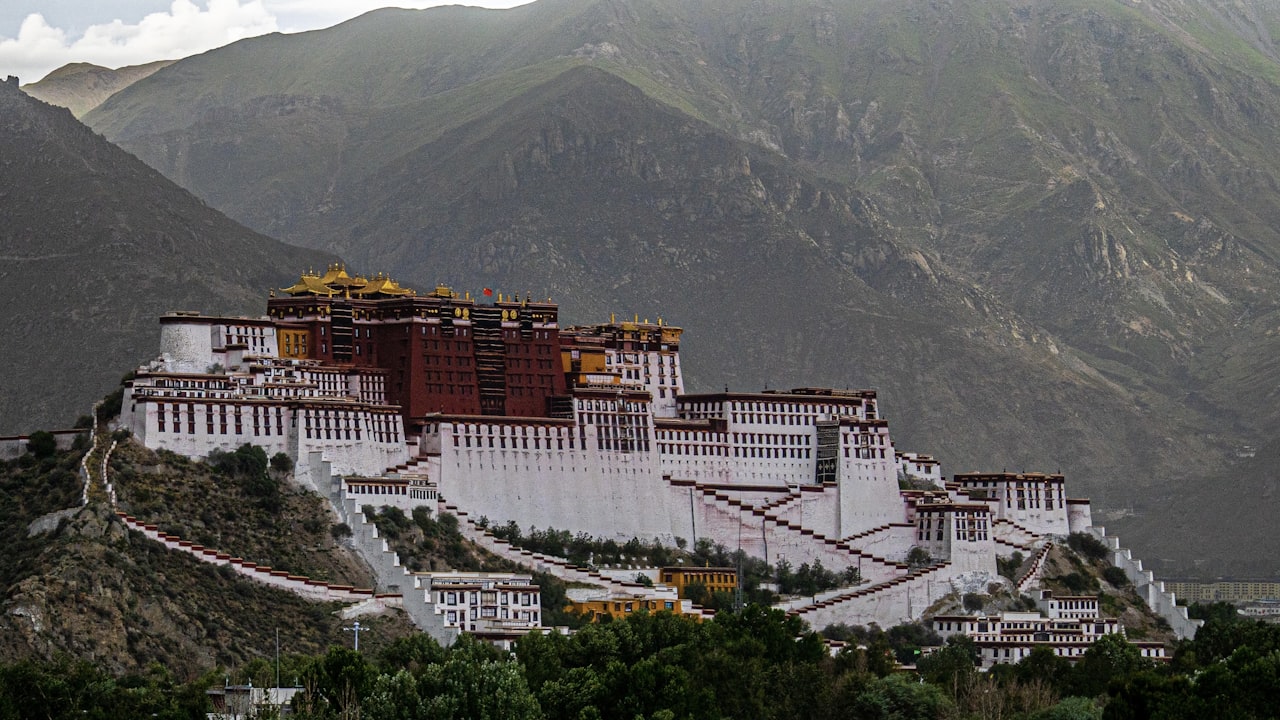 The Potala Palace rising against the mountains in Lhasa, Tibet