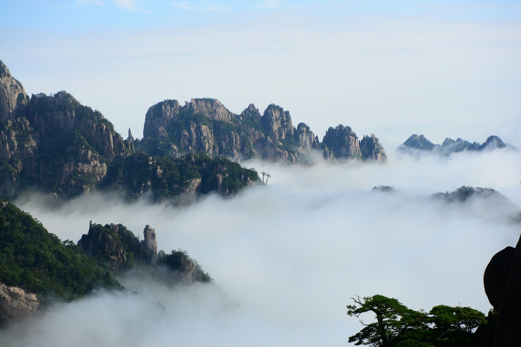 Granite peaks and pine trees on Huangshan, the Yellow Mountain, in Anhui, above a sea of clouds